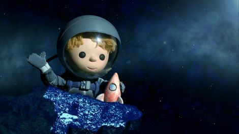 Junge im Kosmos mit Spielzeugrakete und Asteroid; Unser Sandmännchen (Quelle: rbb)